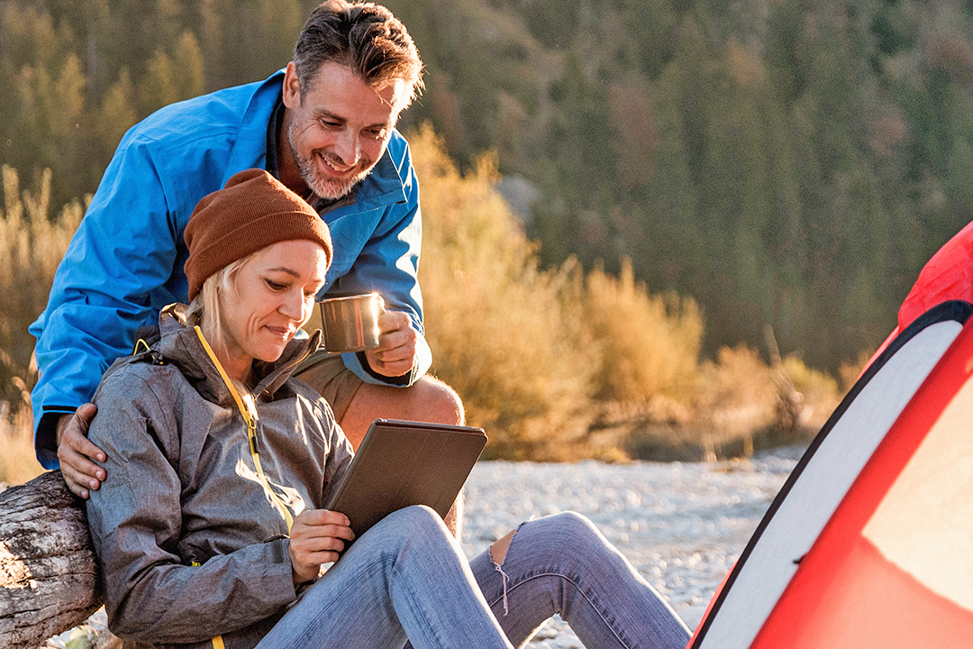 man and woman camping