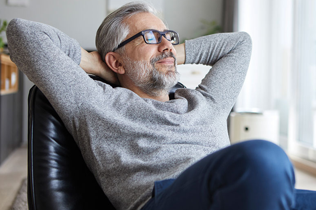 man relaxing in chair