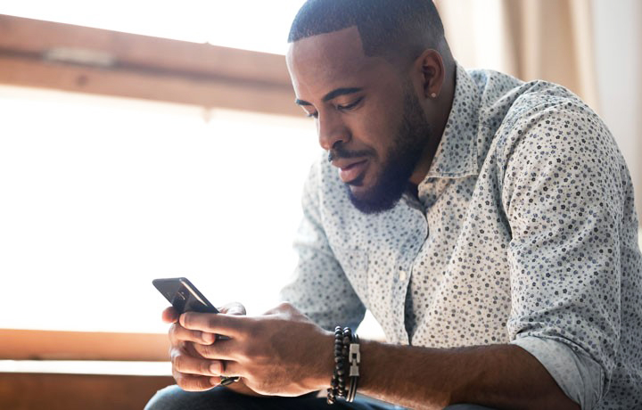 man on mobile device