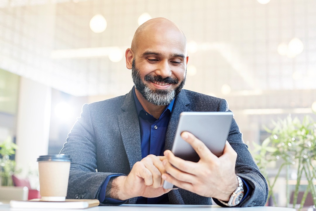 Man on iPad